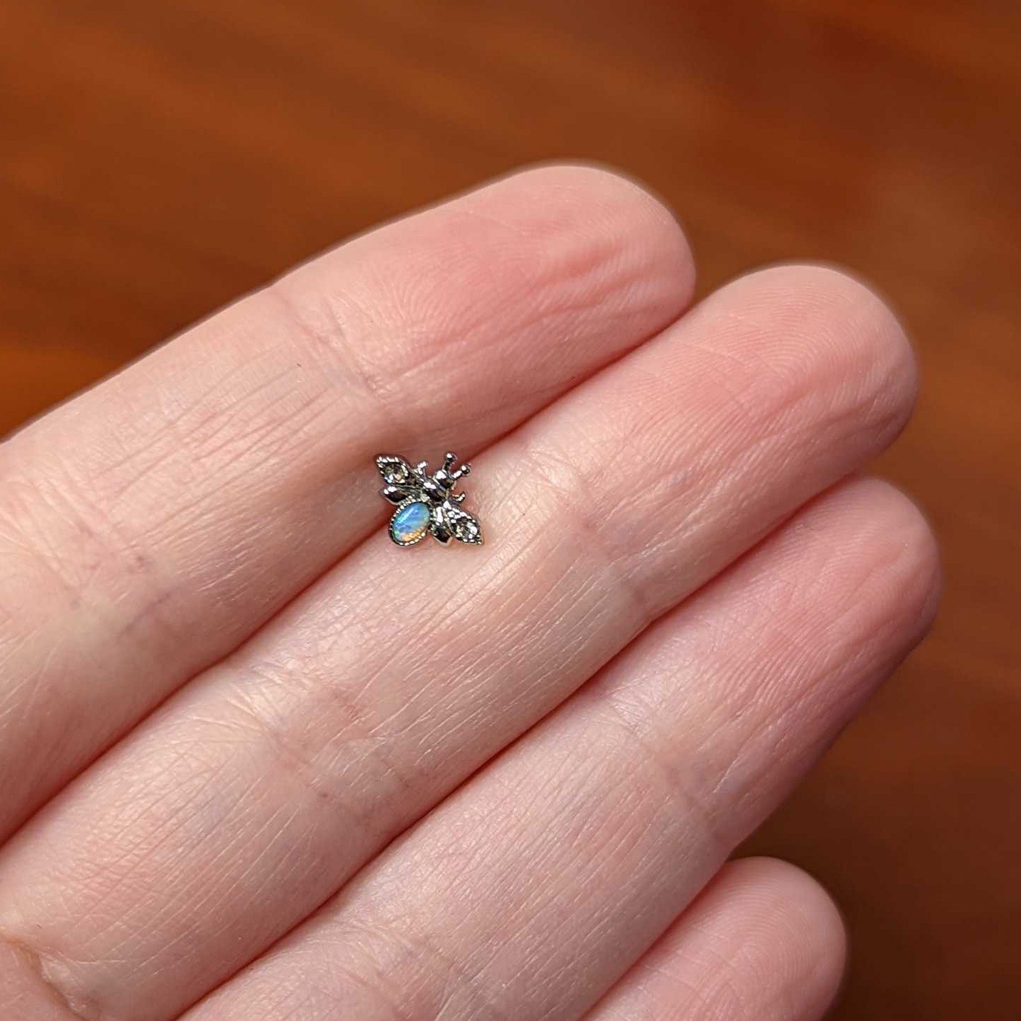 20G 1/4 White Synthetic Opal Insect Nose Bone