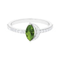 0.7 Carat Marquise Cut Peridot Ring with Diamond Accent
