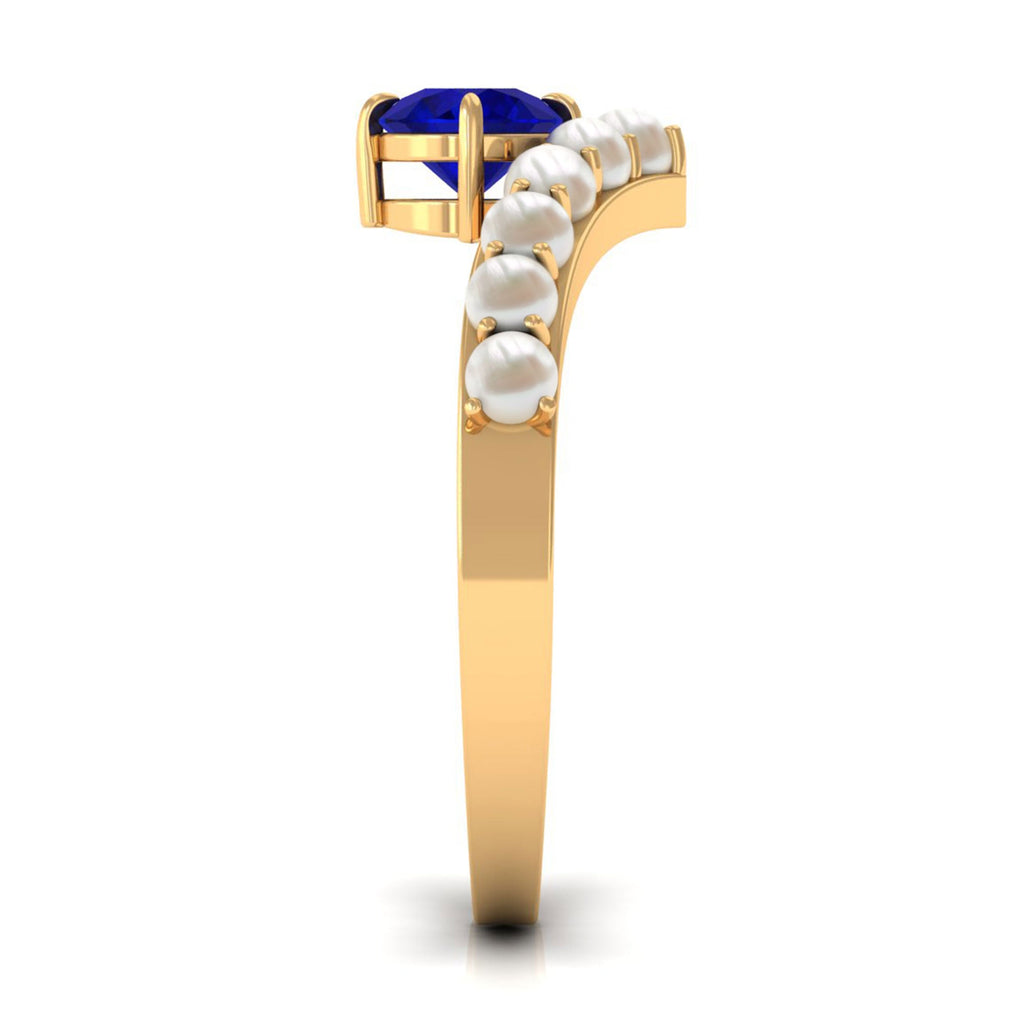 0.9 Carat Solitaire Blue Sapphire and Freshwater Pearl Chevron Ring