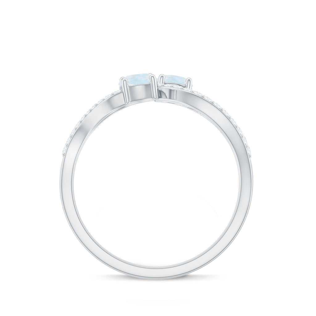 Minimal Moonstone and Diamond Infinity Engagement Ring