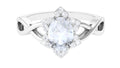 0.6 Carat Oval Cut Solitaire Moonstone and Diamond Floral Halo Ring