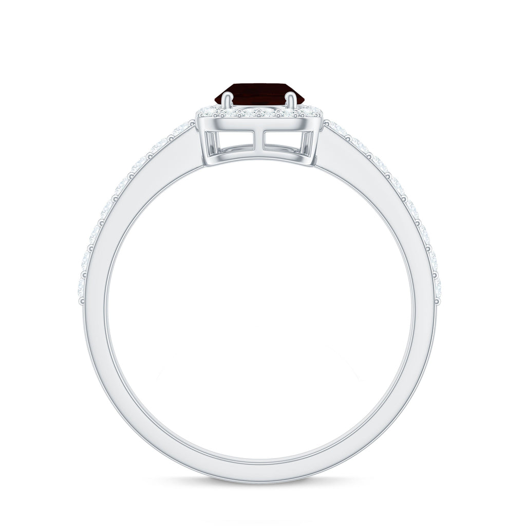 Classic 1.5 Carat Garnet Oval Engagement Ring with Diamond Halo