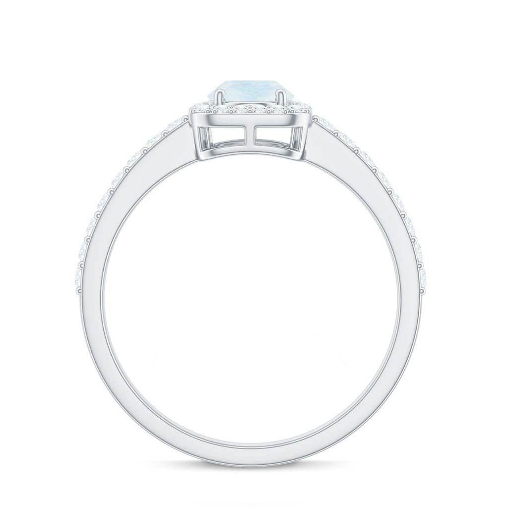 0.6 Carat Oval Cut Moonstone Ring with Diamond Halo